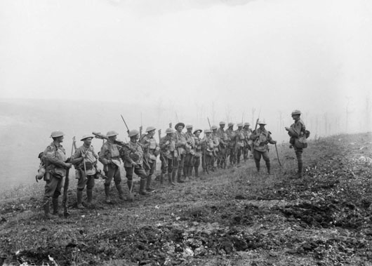 Men of B Company, 29th Battalion, receive an address from their Lieutenant prior to their advance on Harbonnieres (AWM E02790).