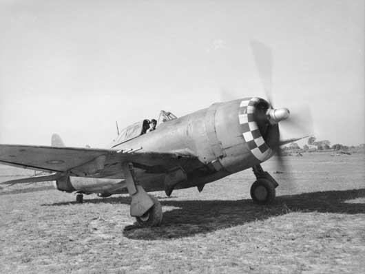 RAAF Warrant Officer F.J. Kevin taxies his aircraft of 258 Squadron RAF to a dispersal bay at an advanced airfield in the Arakan, on the Burma front (AWM SEA0046).