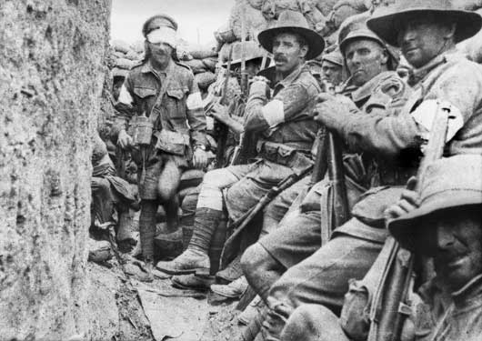 1st Battalion troops waiting near Jacob's Trench for relief by the 7th Battalion (AWM A01005).