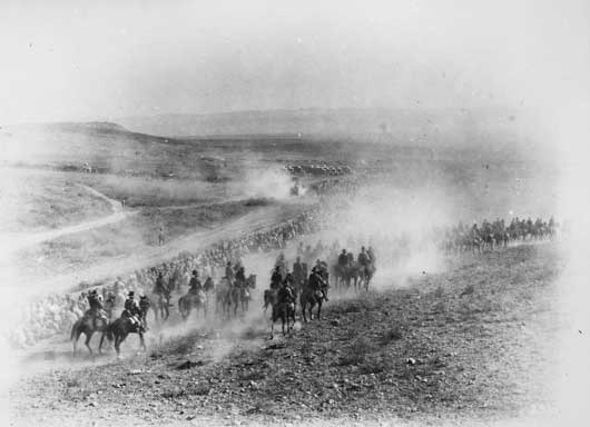 A scene in the dust at Megiddo during the advance on Damascus by the Australian Light Horse (AWM B00256).