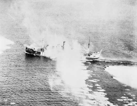Enemy shipping under attack from Beaufighter aircraft of 455 Squadron RAAF in Stav Fjord, Norway (AWM 138202).