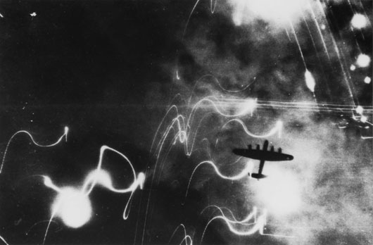 A Lancaster on a night bombing raid on the German city of Hamburg (AWM 044855).