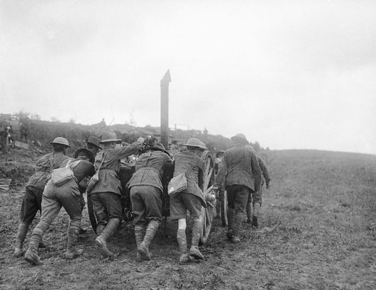 Members of the 6th Brigade bringing one of their field kitchens into position during heavy fighting near Bullecourt (AWM E00437).